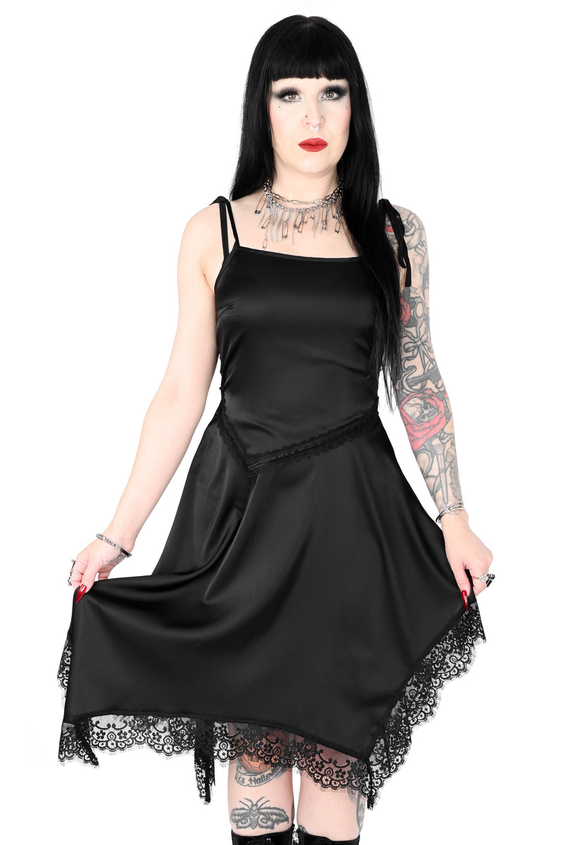 Black satin slip dress with handkerchief hem and lace detailing