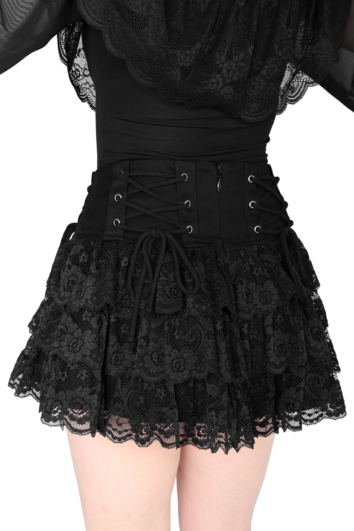 Mini skirt with adjustable lacing on the hip and ruffly lace.