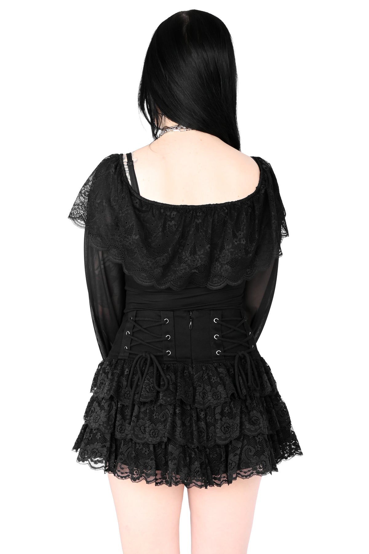 Mini skirt with adjustable lacing on the hip and ruffly lace.
