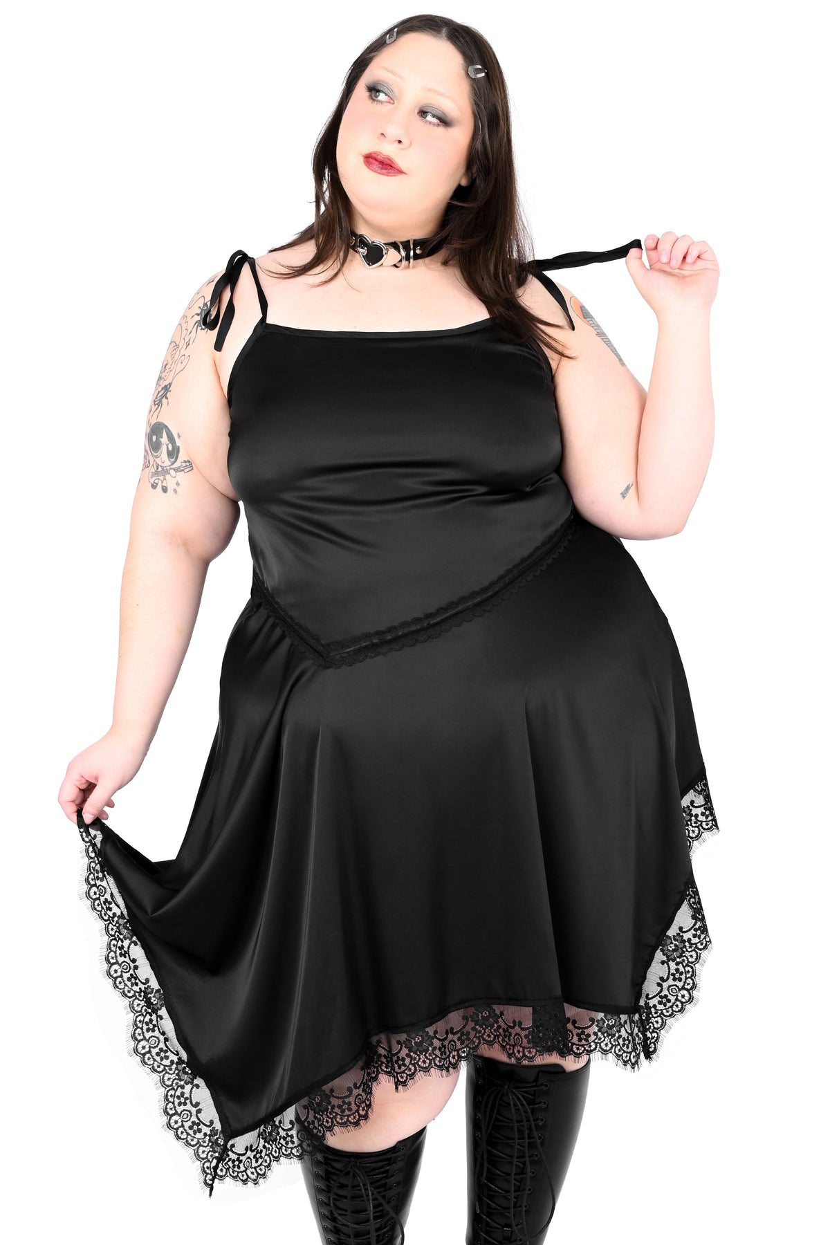 Black satin slip dress with handkerchief hem and lace detailing