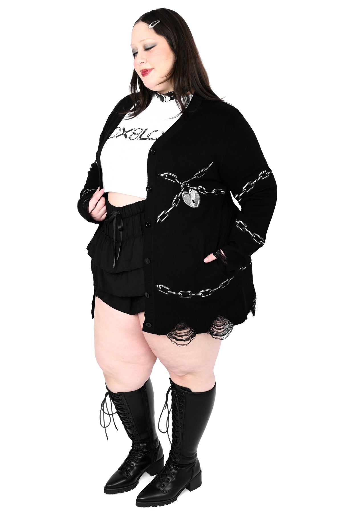 Black button up cardigan with embroidered chain and heart locket