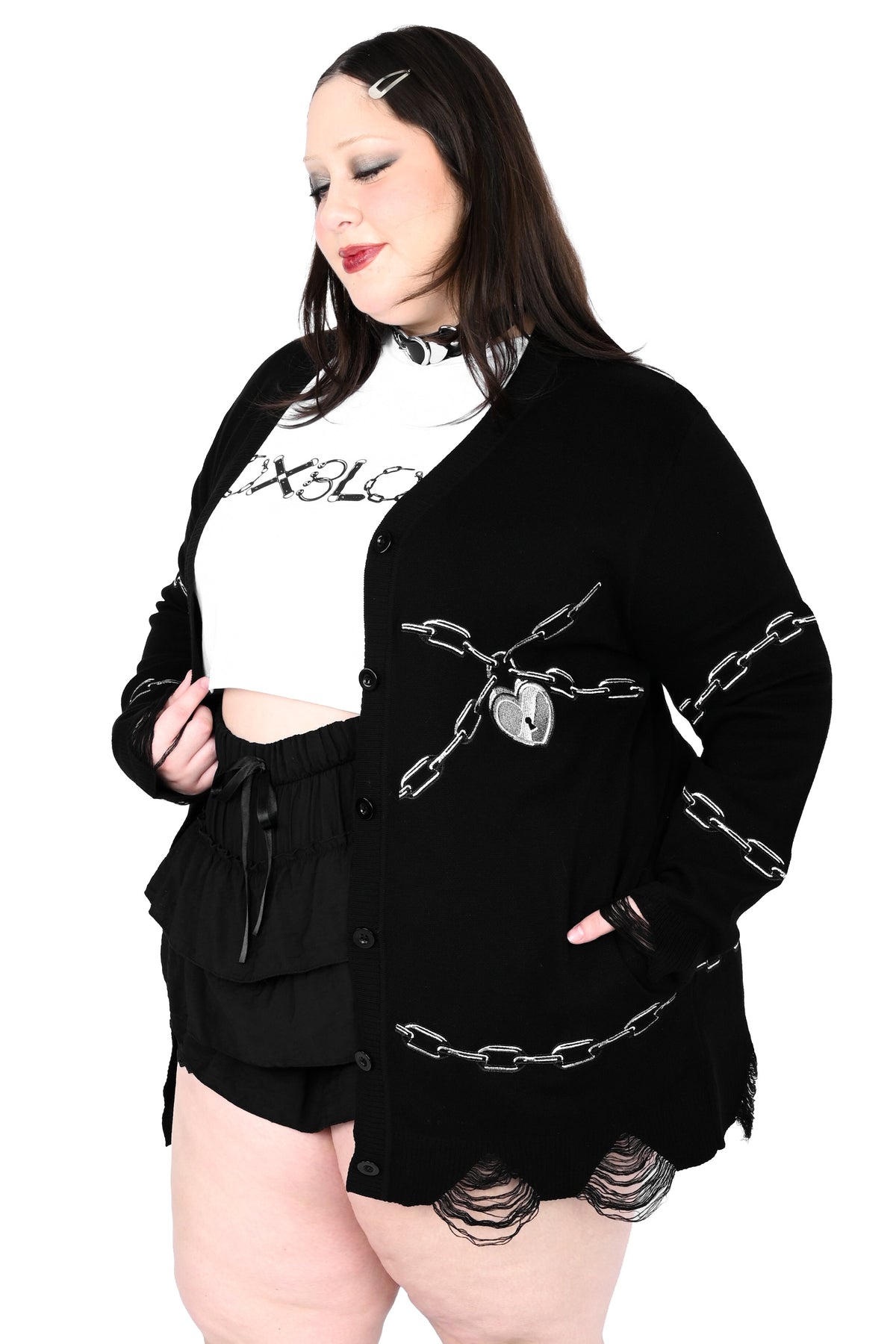 Black button up cardigan with embroidered chain and heart locket