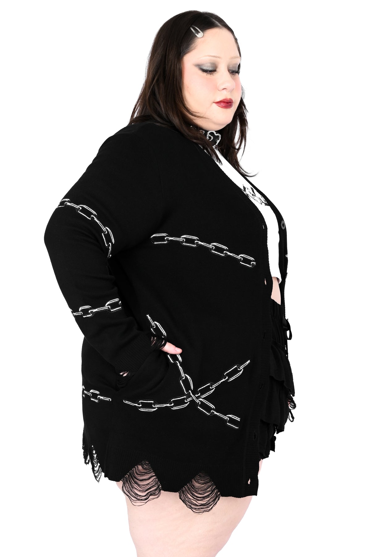 Black button up cardigan with embroidered chain and heart locket