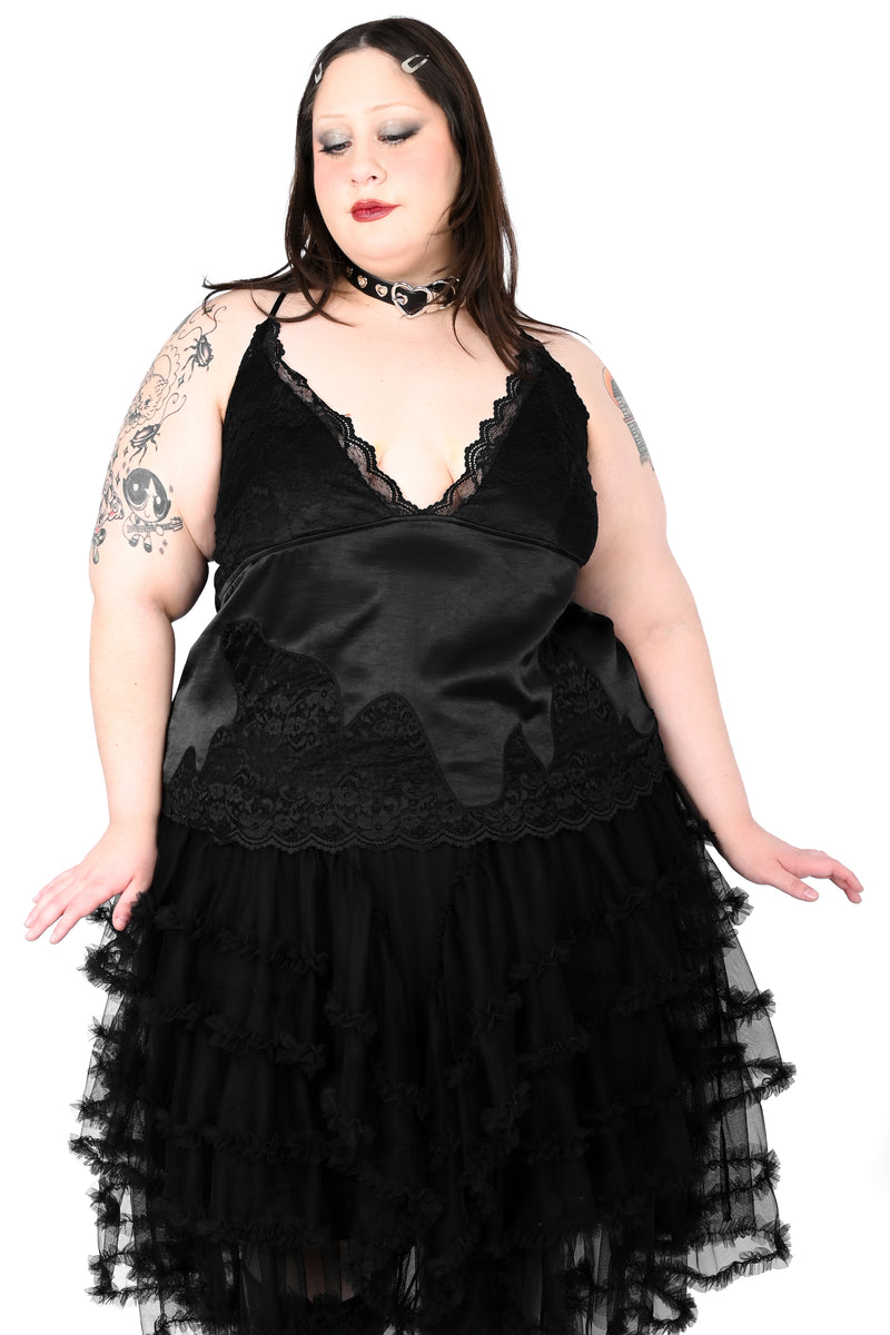 Satin slip top with adjustable straps and lace detail