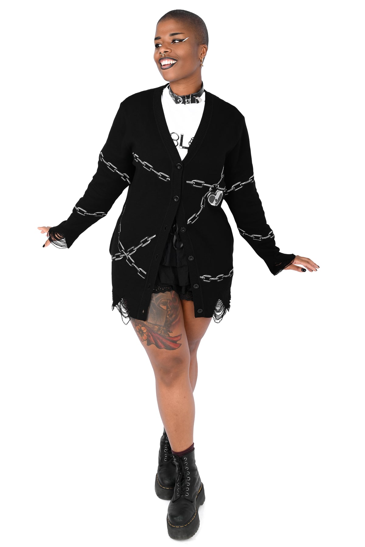 Black button up cardigan with embroidered chain and heart locket