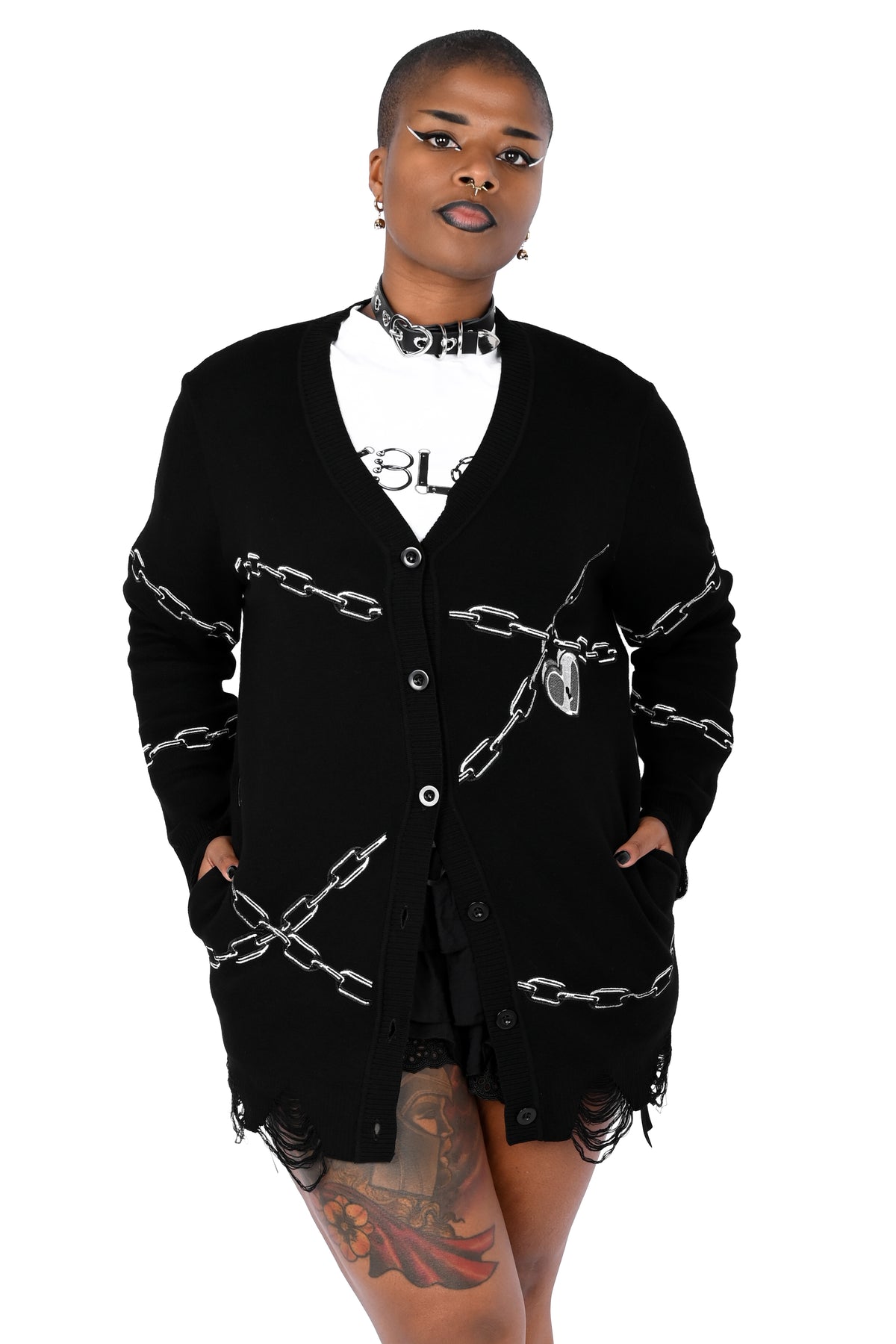 Black button up cardigan with embroidered chain and heart locket
