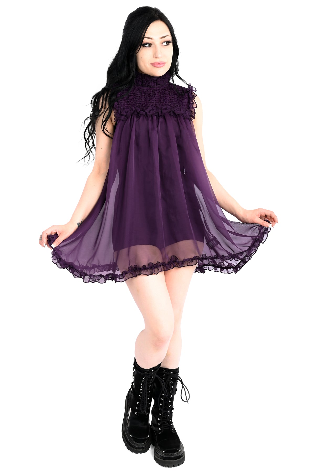 deep purple chiffon babydoll dress with smocking on the neckline and ruffle bottom hem