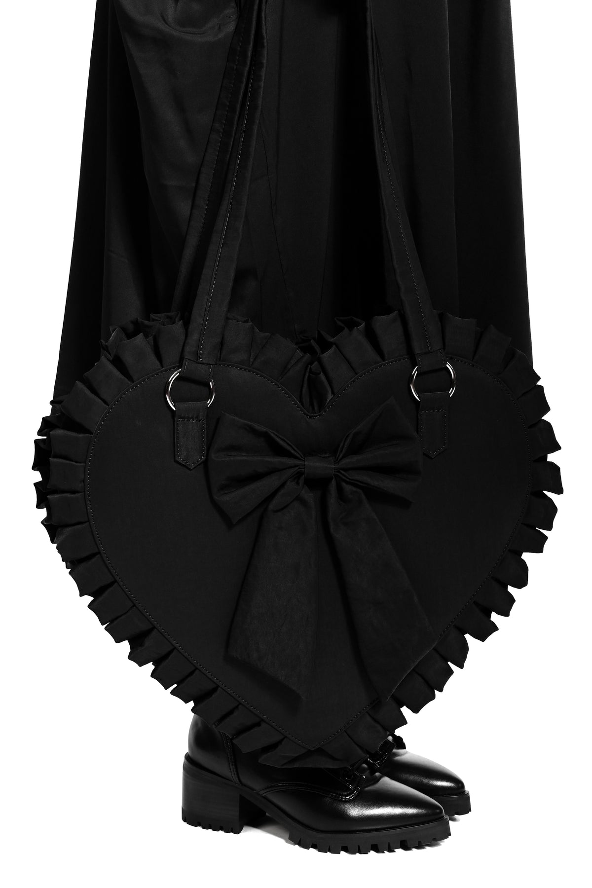 oversized nylon heart tote with bow detail on front and ruffle edges