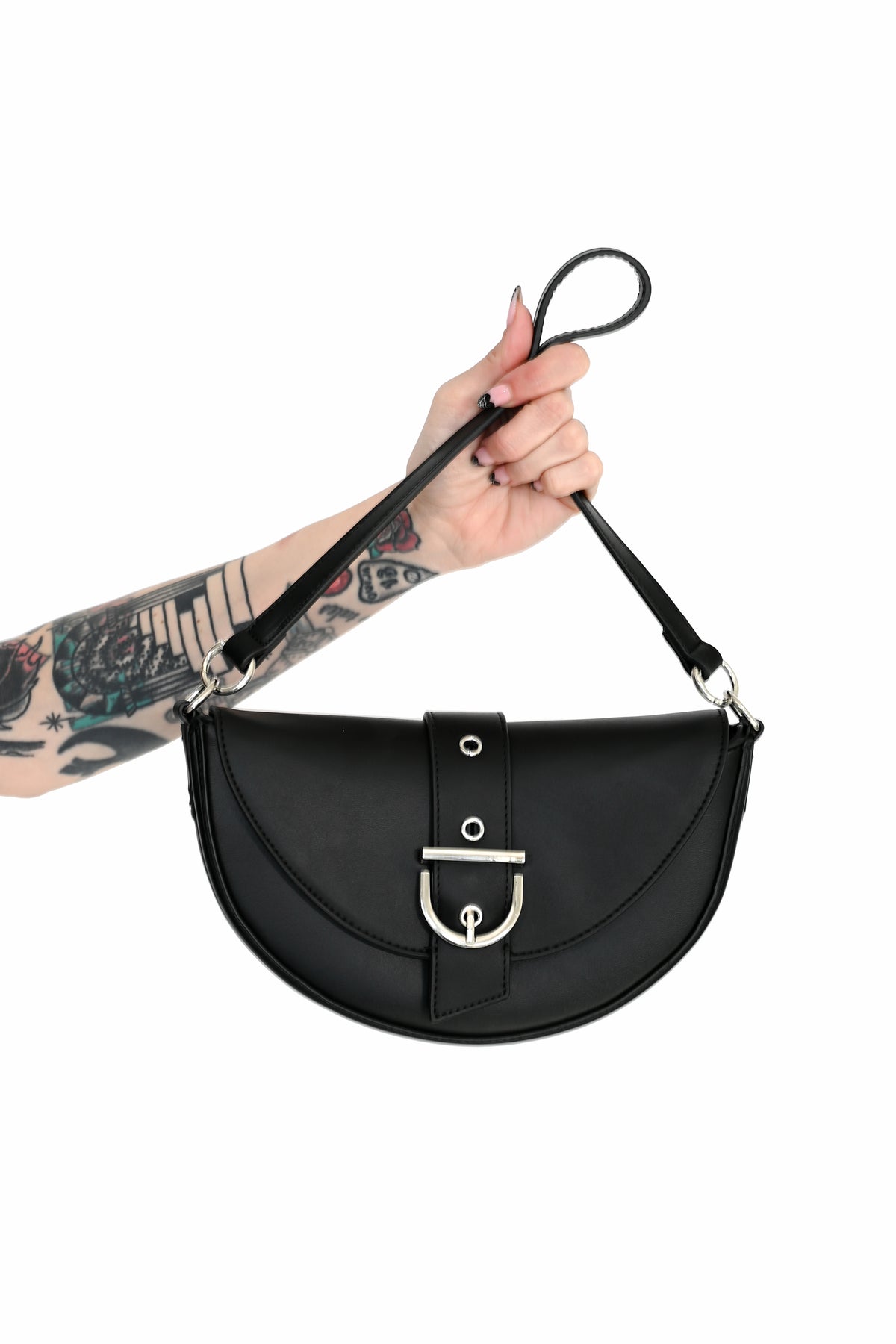 Black faux leather crescent shoulder purse with silver front buckle detail