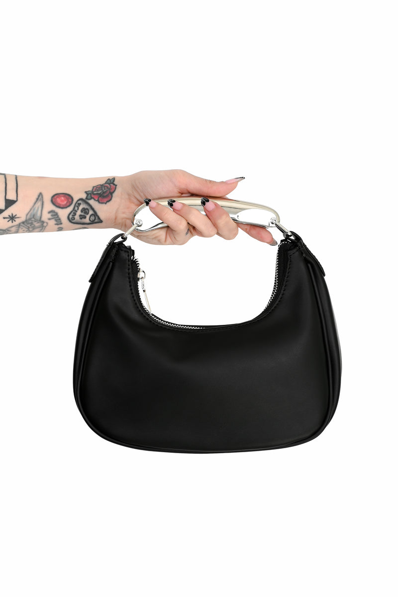 black faux leather purse with a chunky silver plated top handle