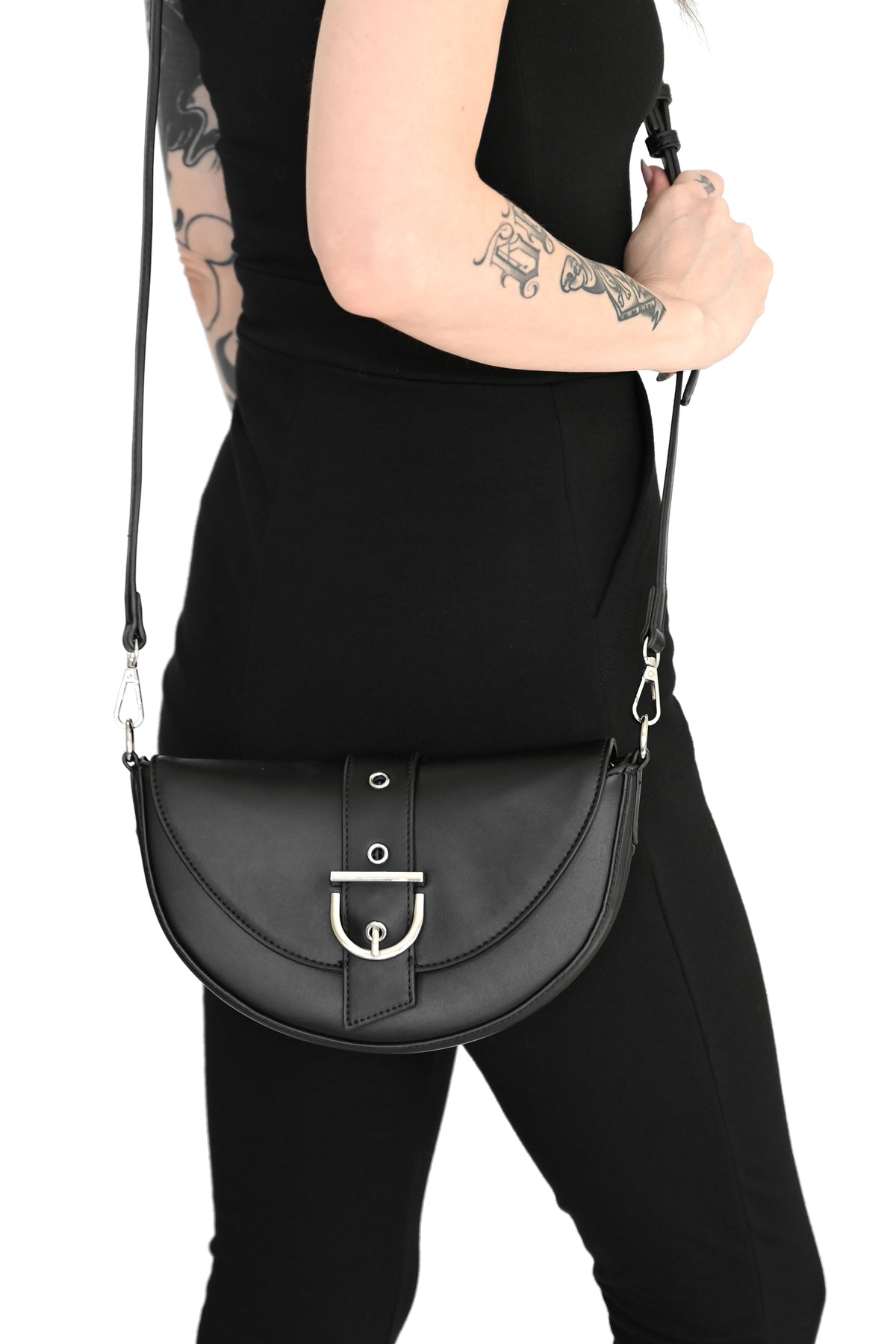 Black faux leather crescent shoulder purse with added crossbody strap and silver front buckle detail