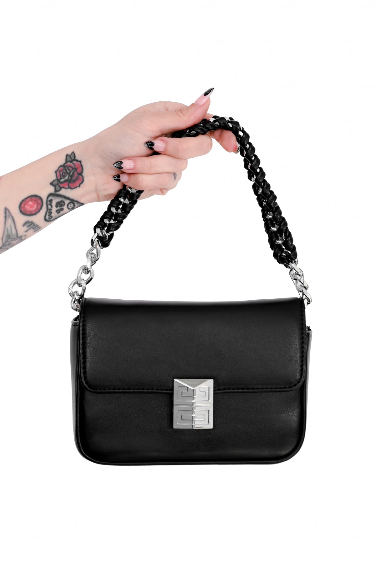 black faux leather bag with front detailed magnetic closure and faux leather braided chain top handle