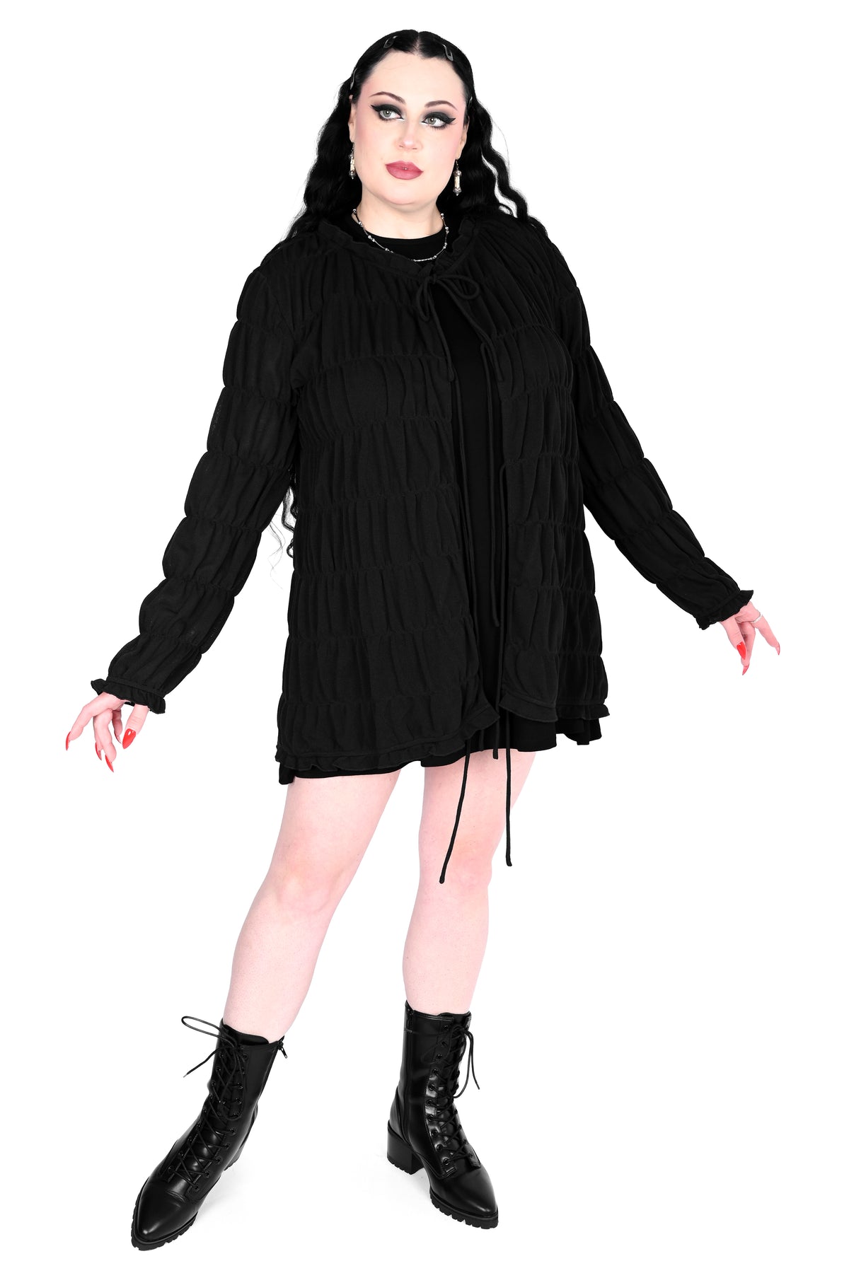Tiered, open front long sleeve top with 3 adjustable ties.