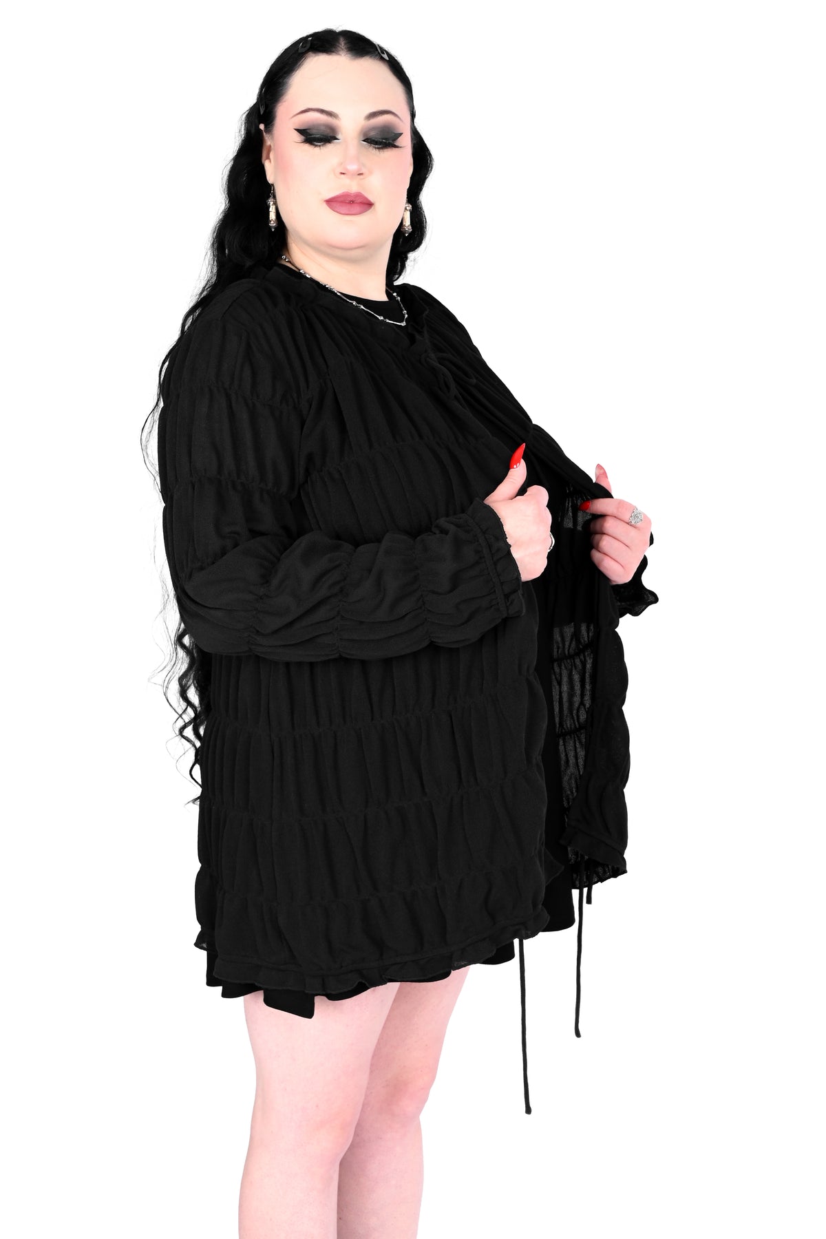 Tiered, open front long sleeve top with 3 adjustable ties.
