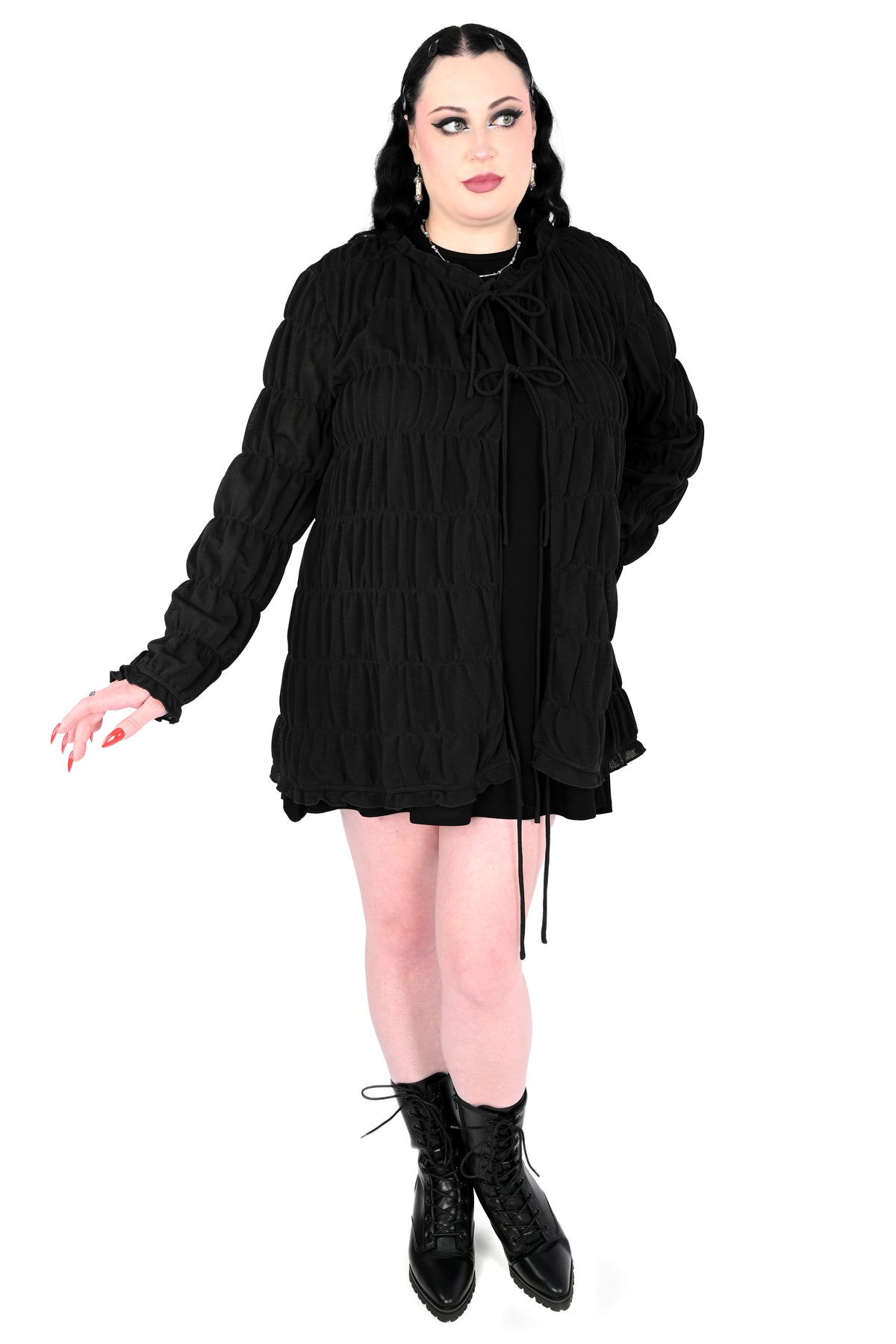 Tiered, open front long sleeve top with 3 adjustable ties.