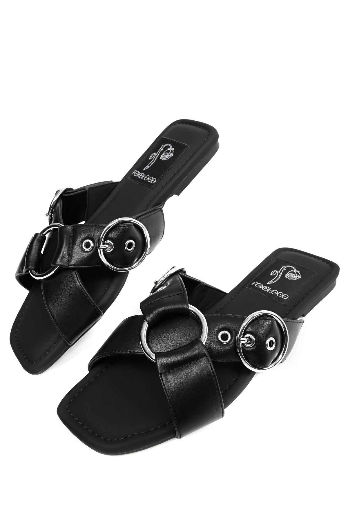 Black slide sandals with o-rings on top and adjustable buckles.