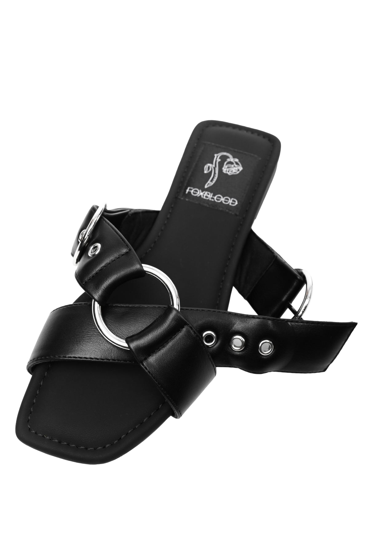 Black slide sandals with o-rings on top and adjustable buckles.