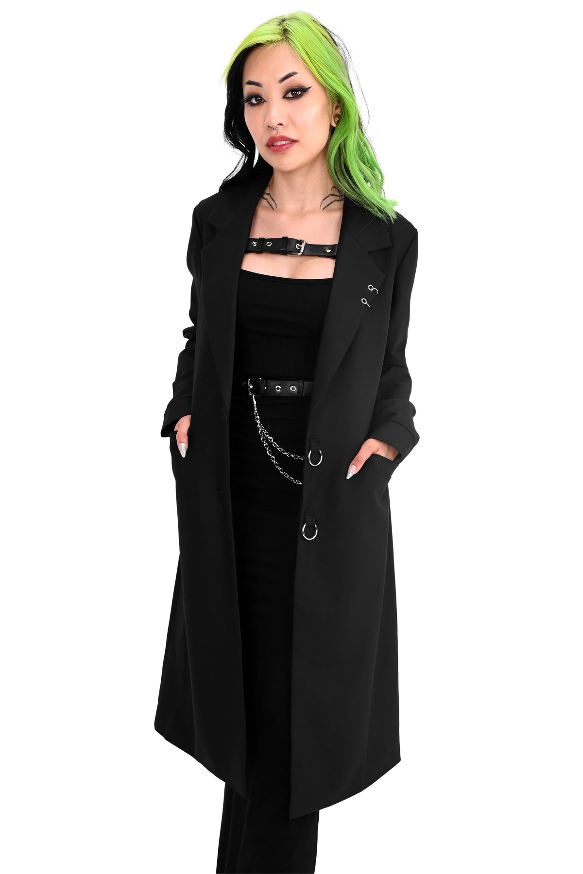 Long black trench coat with two o-ring piercing details on the left lapel