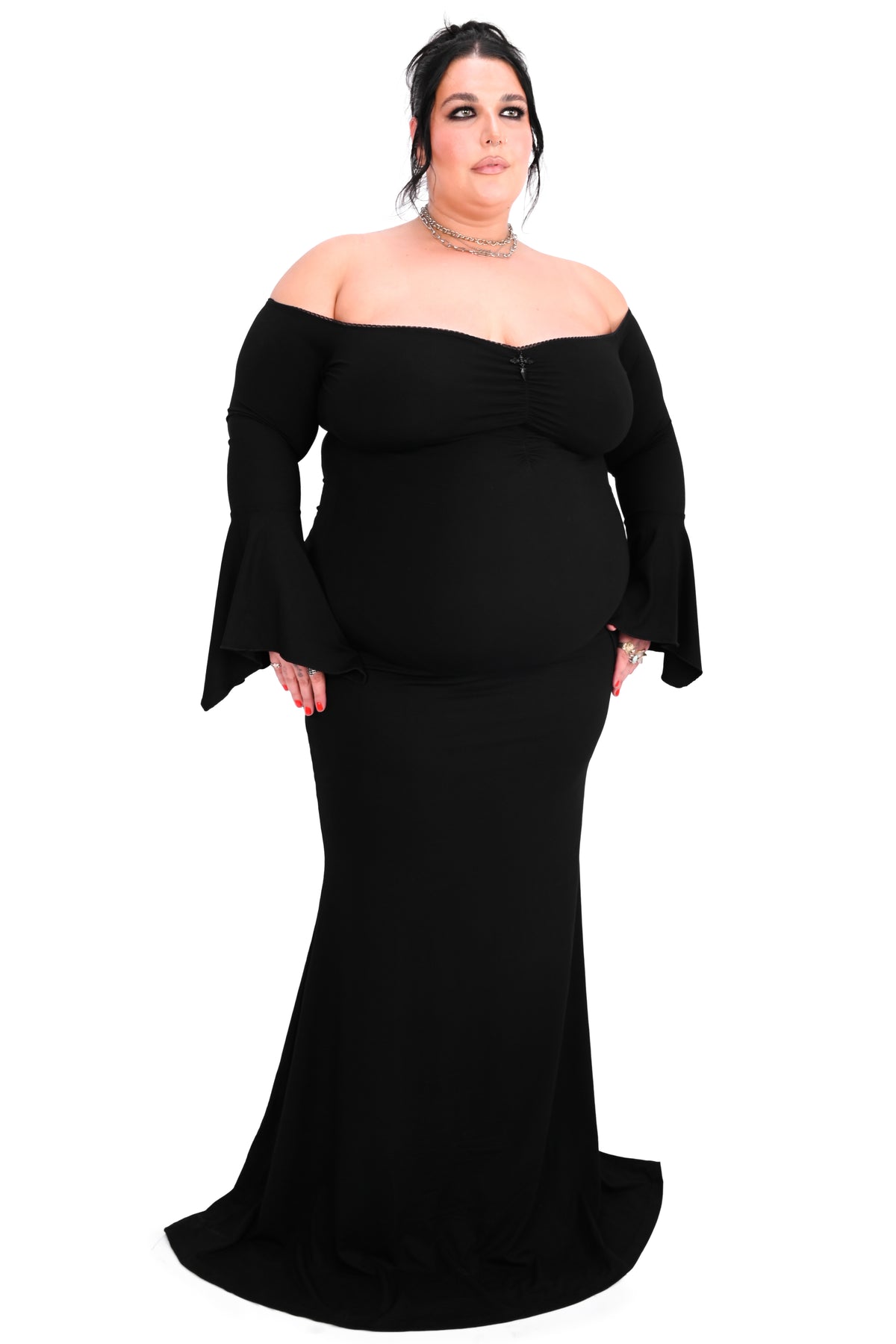 black bell sleeve off the shoulder maxi dress with flared bottom and dagger pendant in the middle of the neckline