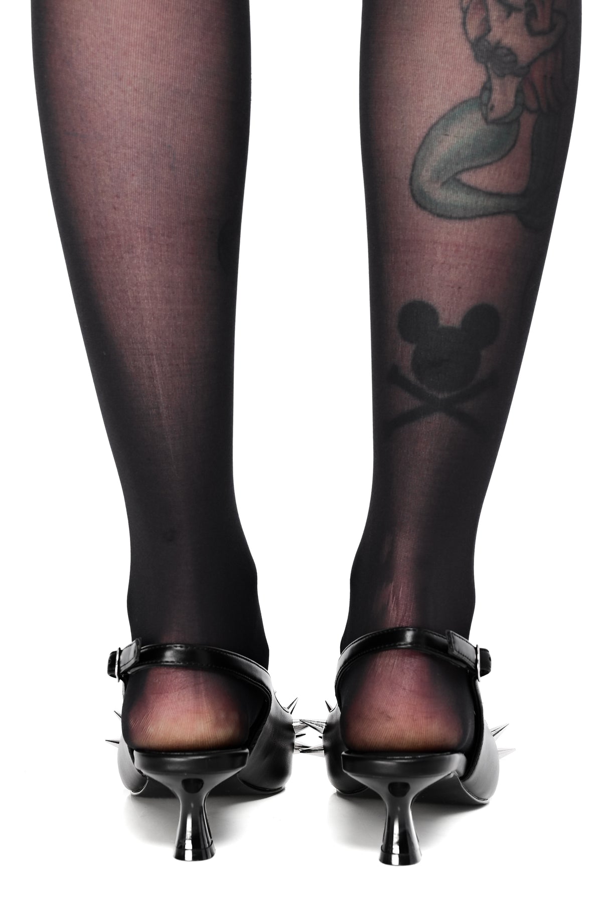 Black sling back kitten heel with spike studs on front