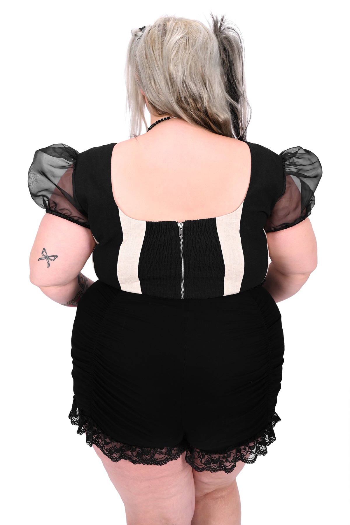 black and off white striped corset top with organza puff sleeves