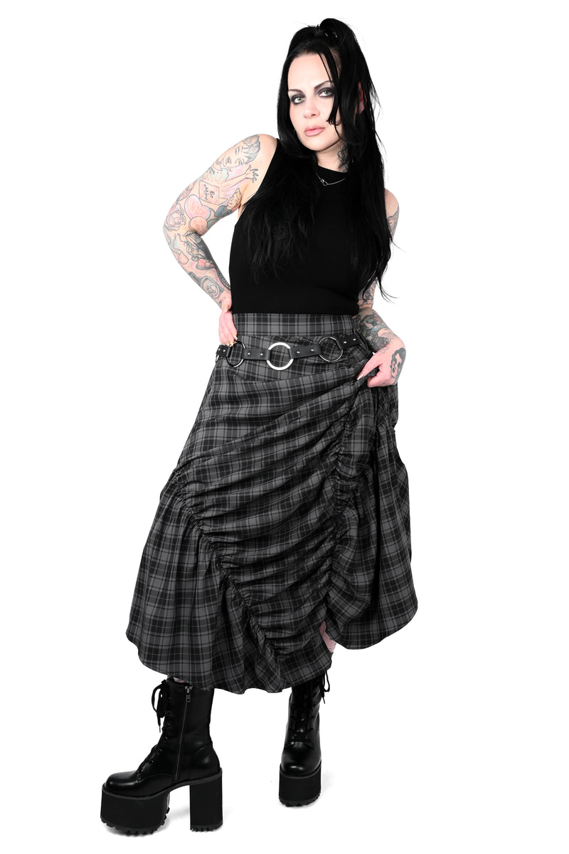 Front view medium sized model wearing a black sleeveless top, grey and black plaid skirt, styled with a chain belt and black platform boots