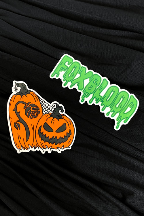 1 sticker with jackolanterns and carved foxblood rose, 1 with foxblood text logo in green slime
