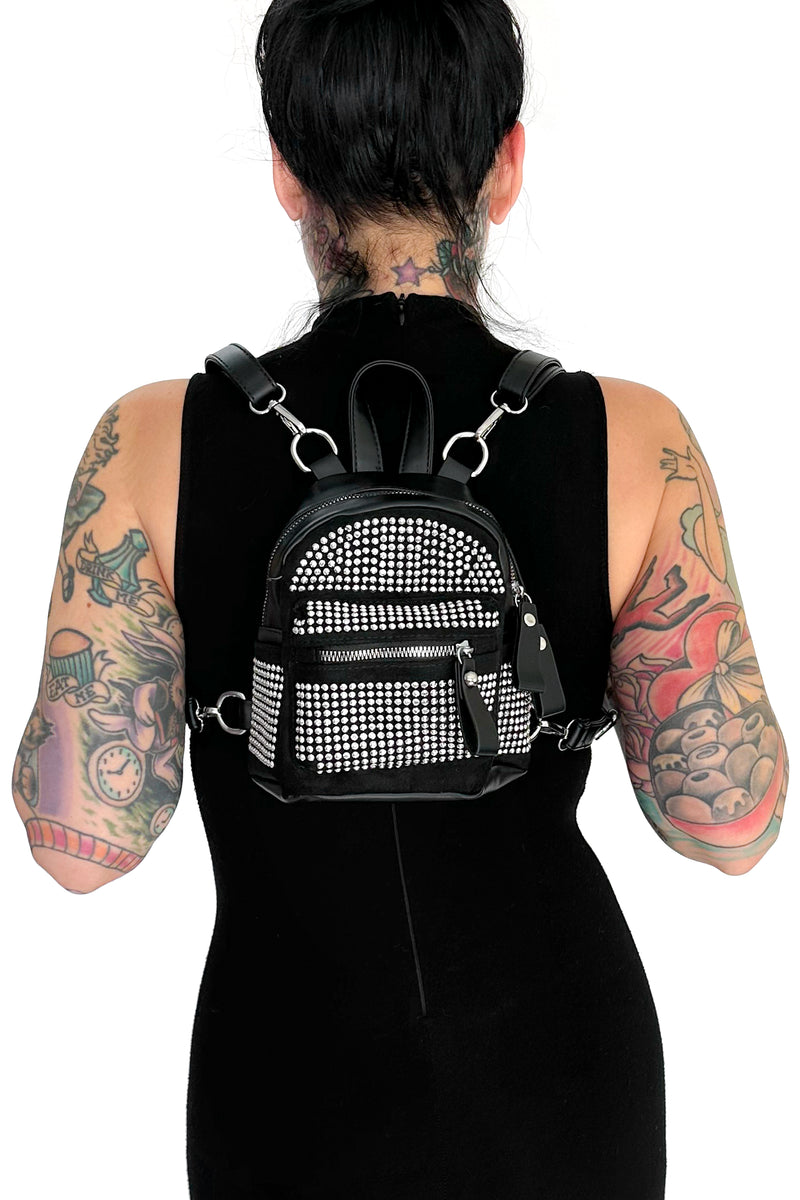 black vegan leather mini backpack with silver rhinestone studs all over