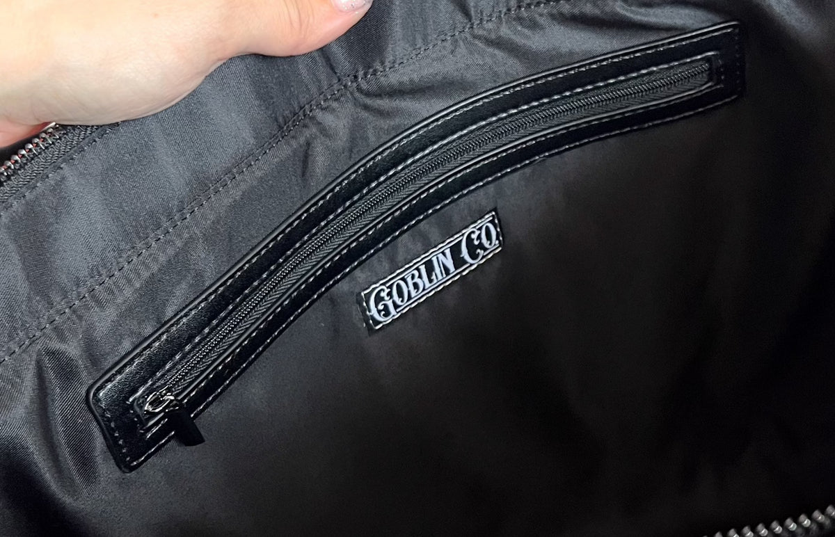 inside of PU tote bag with goblin co label