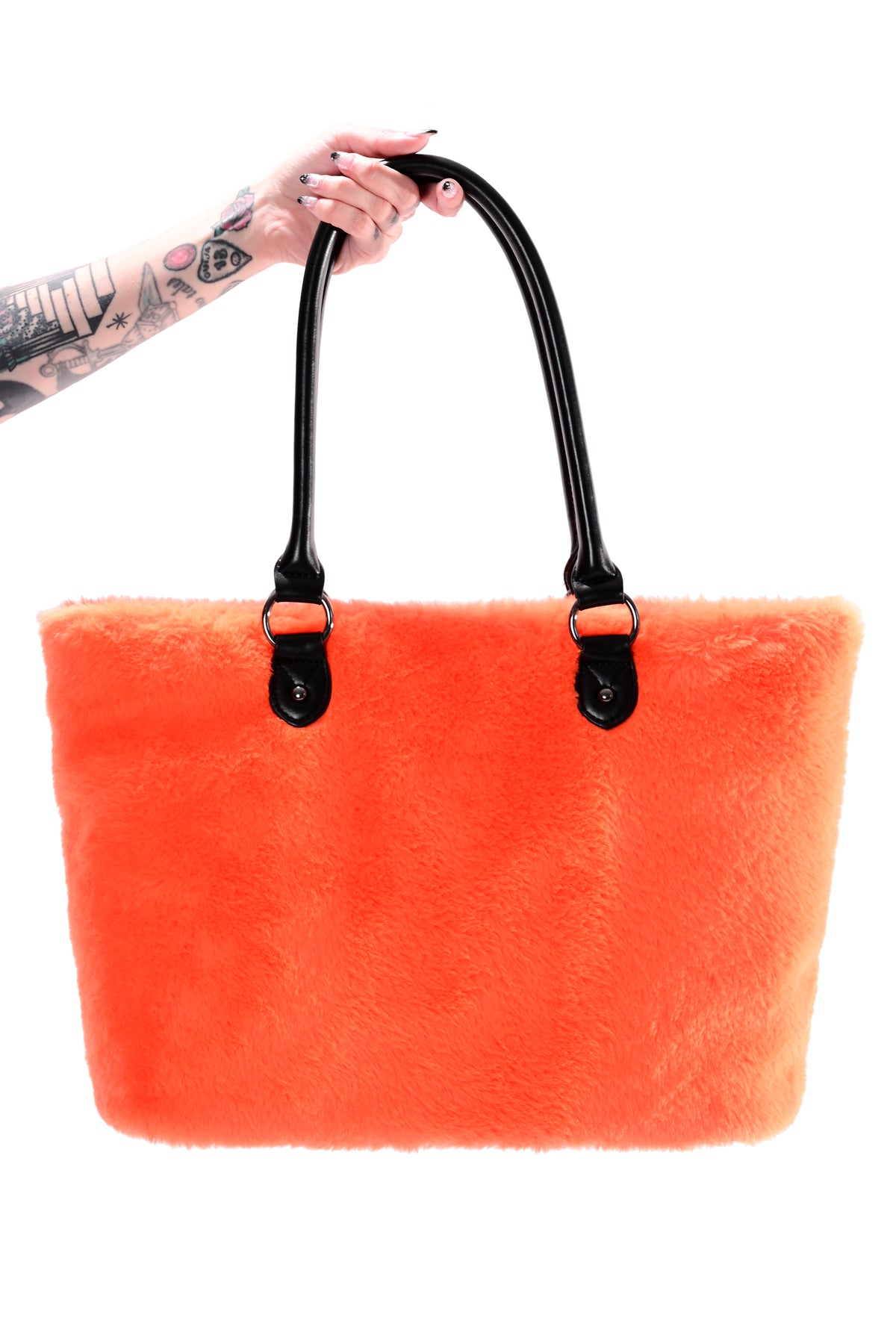 orange faux fur tote bag with black jackolantern face