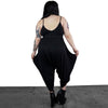 black oversized drop crotch jumpsuit with thin shoulder straps and scooped back