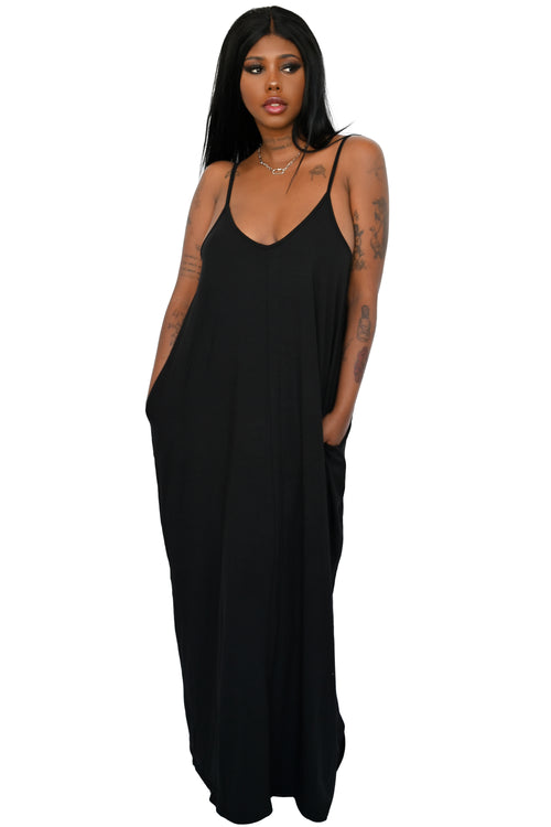 black maxi dress with thin shoulder straps and pockets