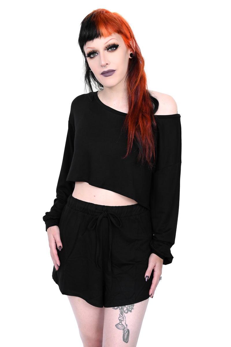 oversized crop bishop sleeve top and loose shorts with an elastic waist.
