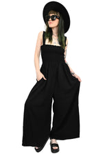 smocked strapless wide leg jumpsuit. Straps are a couple inches wide.