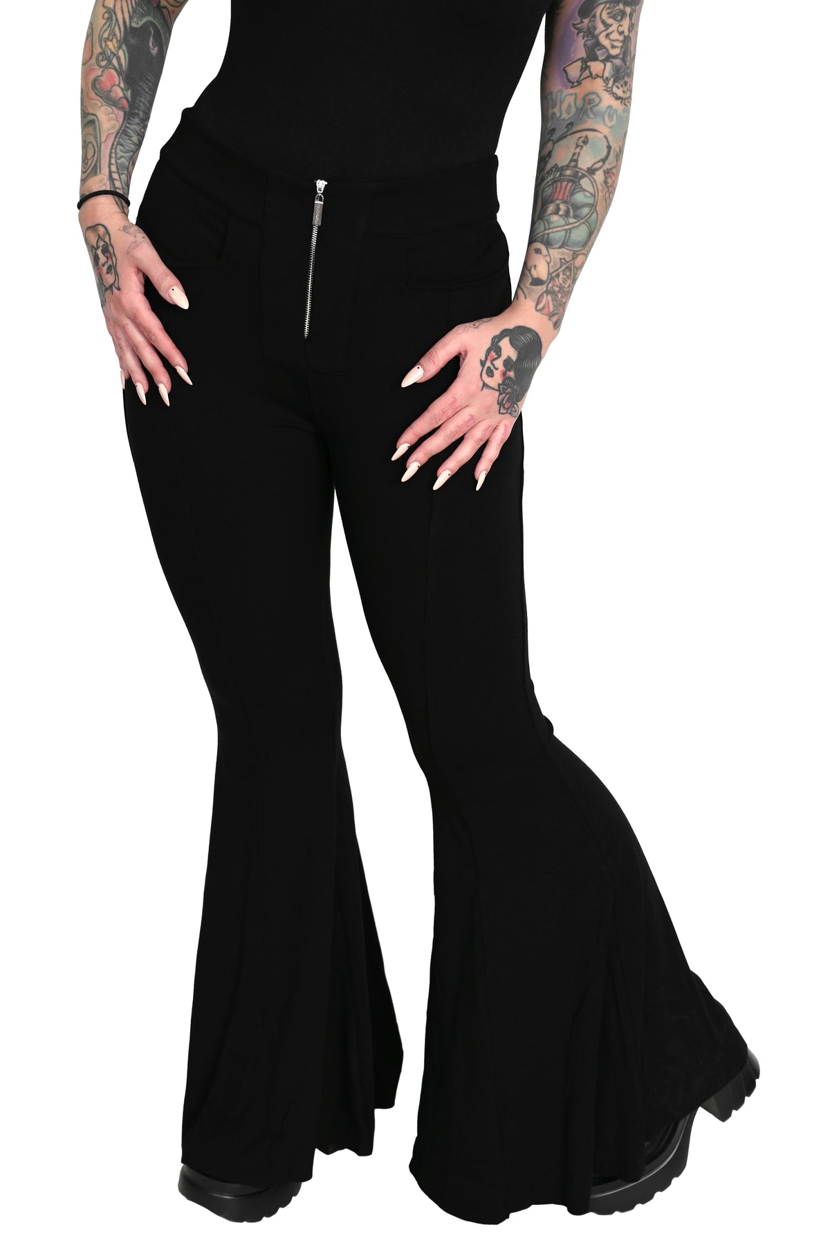 black bellbottoms with a silver front zipper