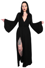 Dramatic bell sleeve wrap top with deep cut V-neck line. Long skirt bottom with one sky high sexy side slit. It has a built in full backside bodysuit bottom with snap crotch to keep the dress in place.