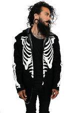 Black zip up hoodie with full front, back and arm skeleton print. This sweater is super warm and comfy, and the perfect length.