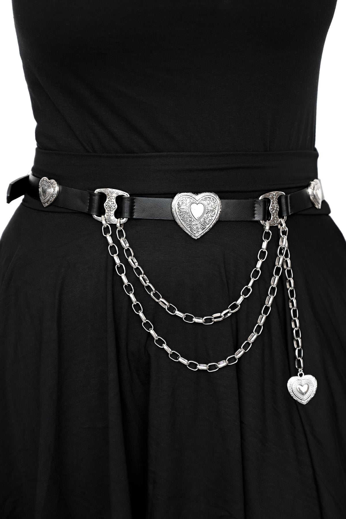 Vegan leather buckle belt with detailed hearts and chains.. Black vegan leather with silver metal