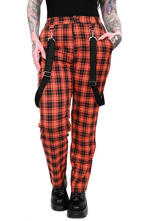 black and orange plaid pants with black hanging straps