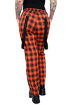 black and orange plaid pants with black hanging straps