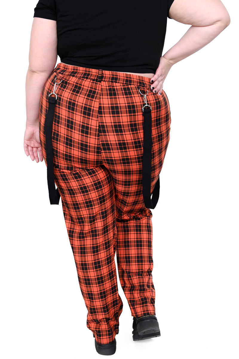 black and orange plaid pants with black hanging straps