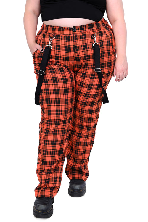 black and orange plaid pants with black hanging straps