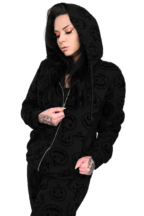 black zip up hoodie with flocked jackolantern pattern