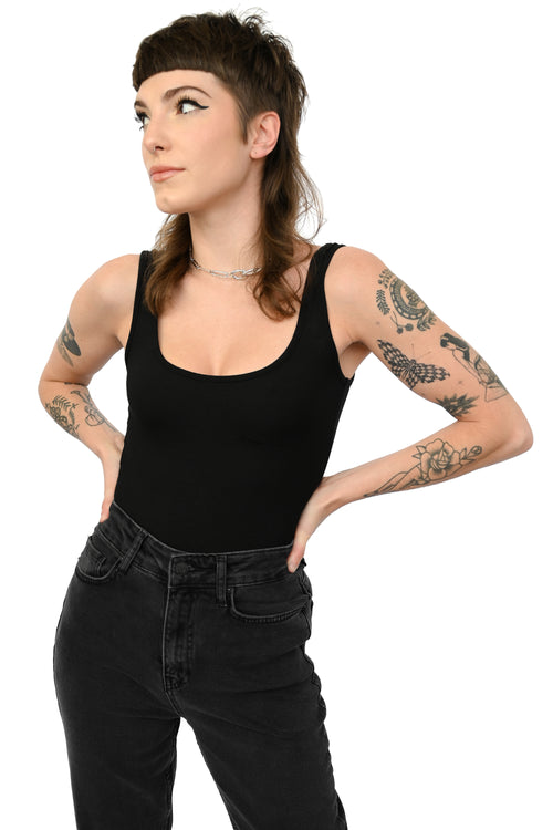 black bodysuit layered with our relaxed denim
