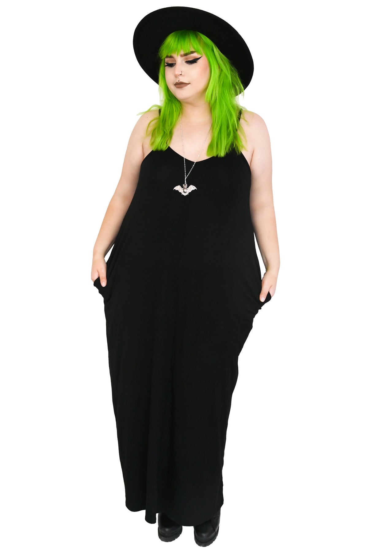 black maxi dress with thin shoulder straps and pockets