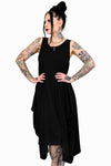 black sleeveless dress with a scoop neck and asymmetrical skirt
