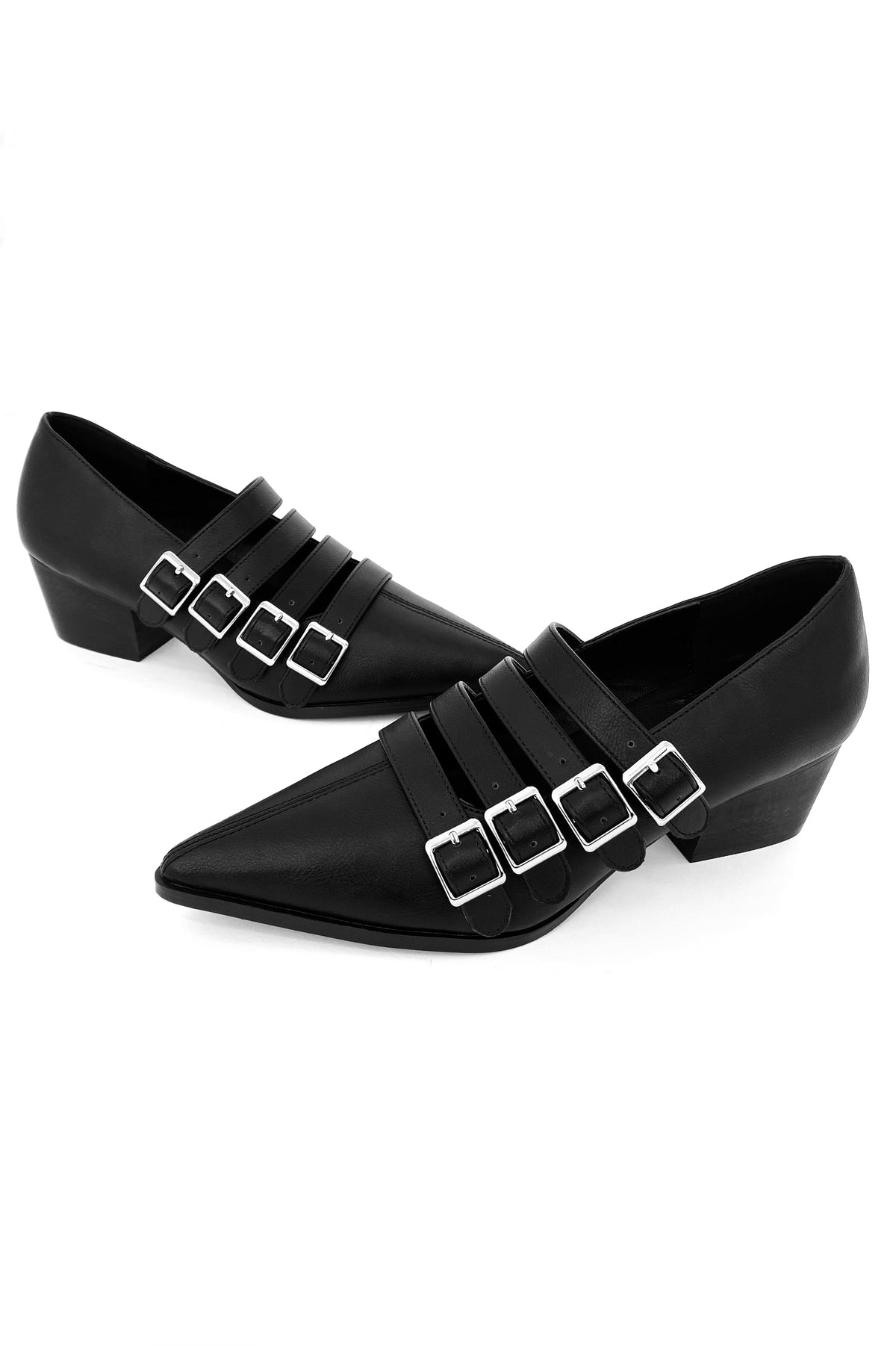 black vegan leather shoes with a small heel and four straps with metal buckles