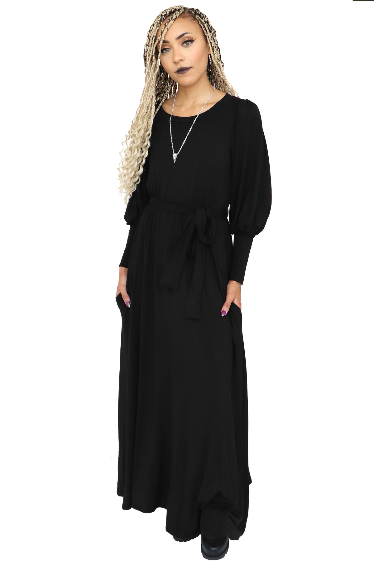 Black long sleeve floor length dress. 