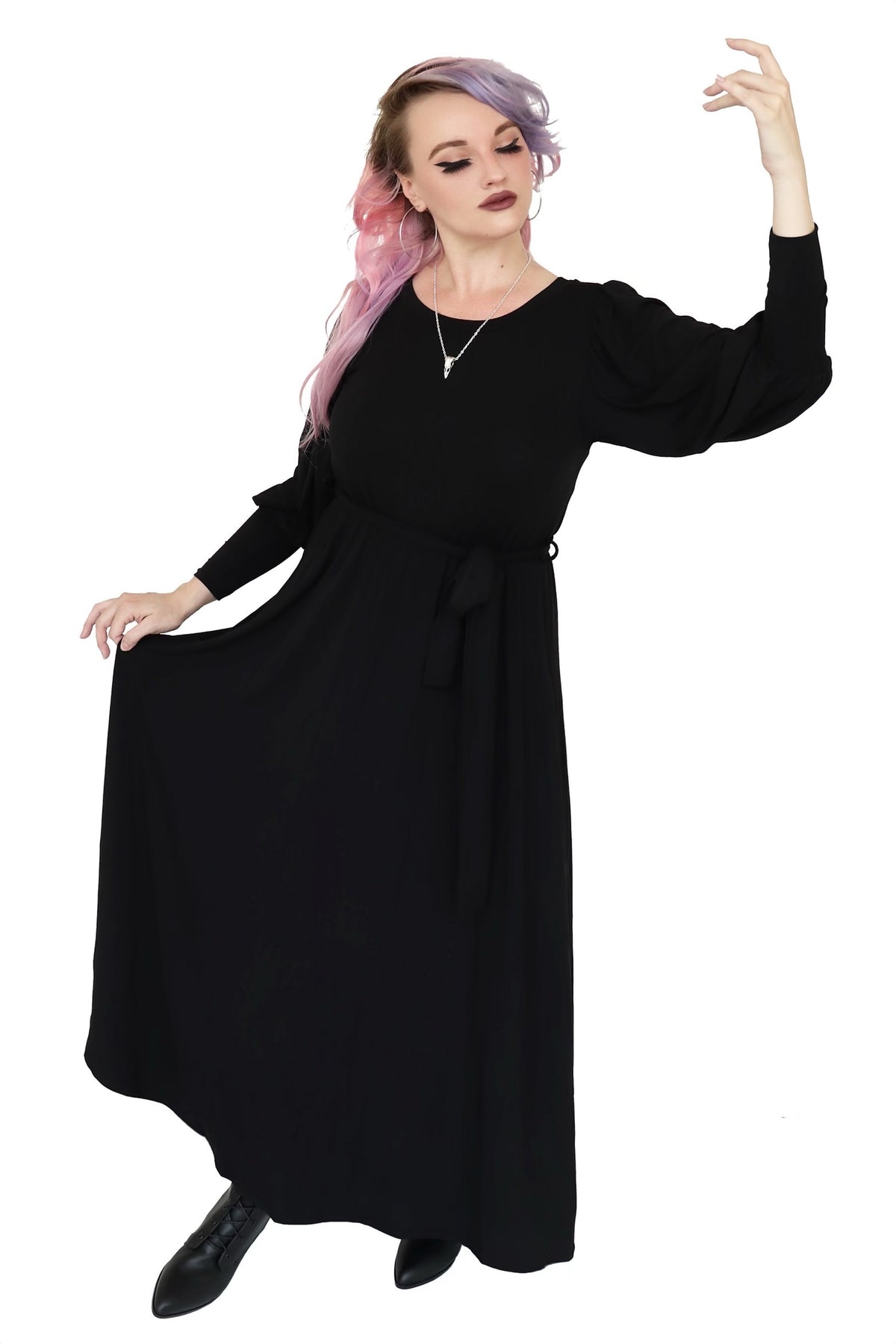 Black long sleeve floor length dress. 